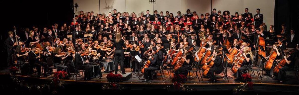 Stage with Orchestra and Choir Students