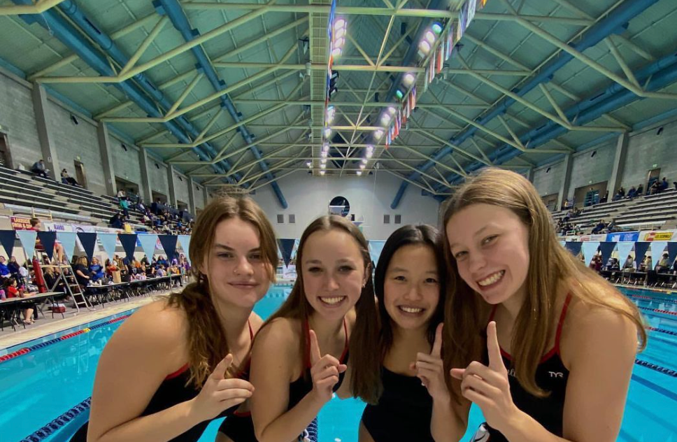 Girls' Swim & Dive Students at pool